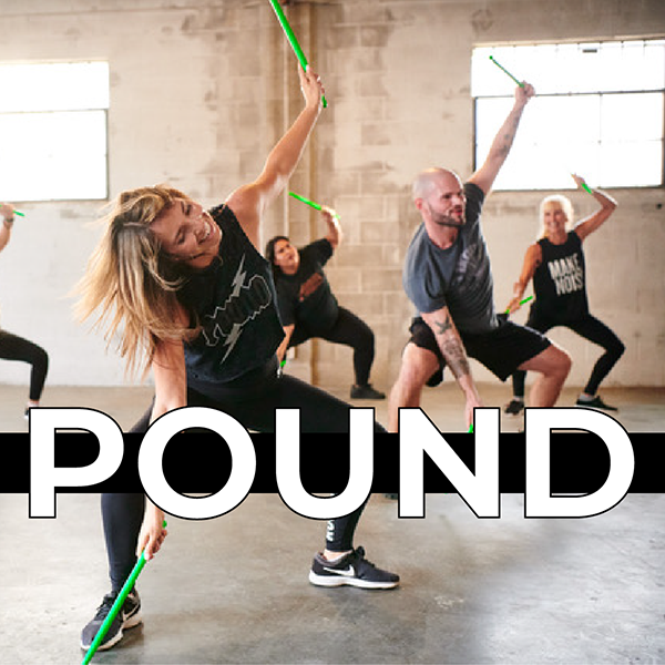 POUND class exercises with lightly weighted drumsticks